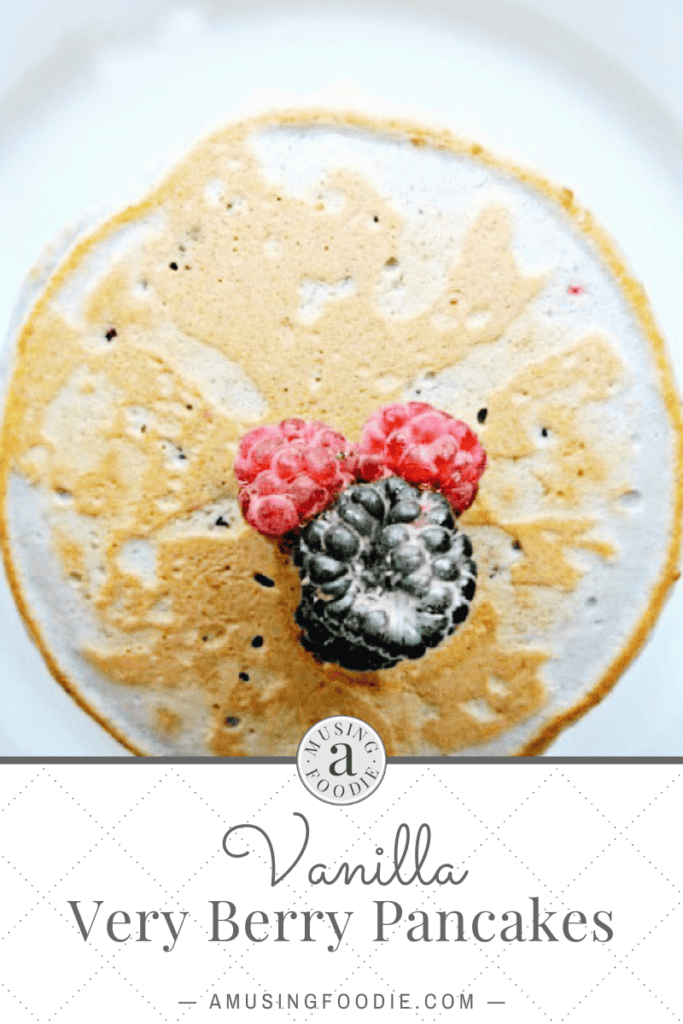 Pancakes with berries on top.