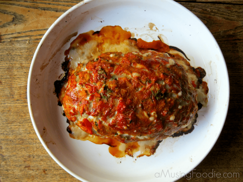 Turkey Meatloaf Baked turkey meatloaf on a white plate.