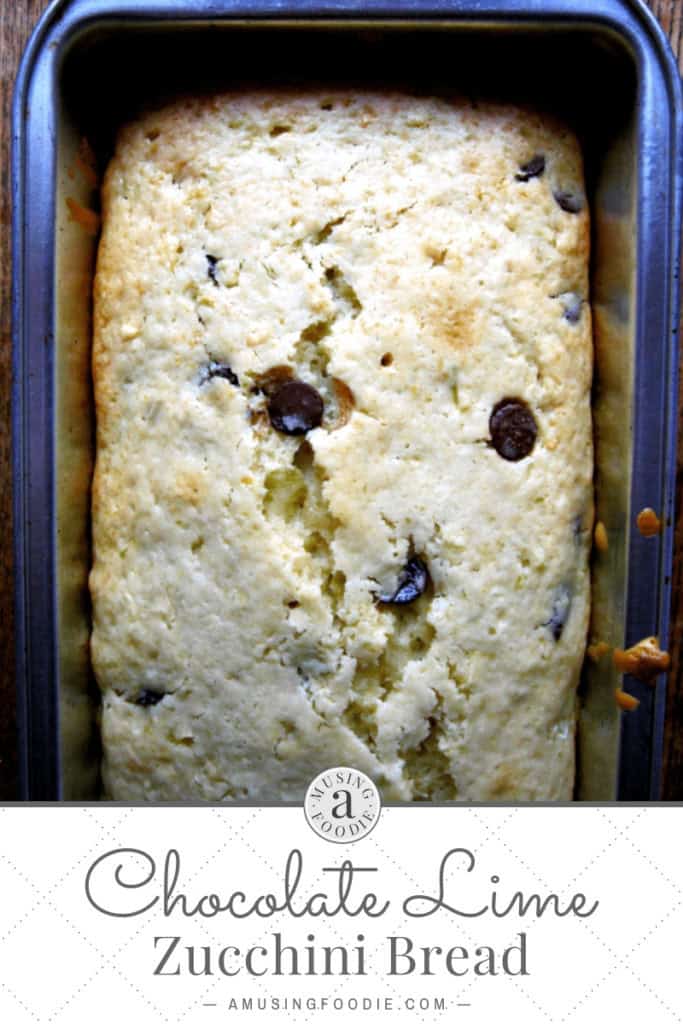 Chocolate lime zucchini bread cooling, freshly baked and in a loaf pan.
