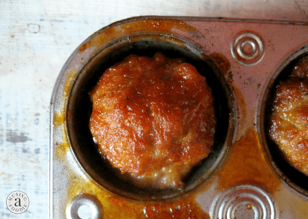 These barbecue pork meatballs, made right in a muffin tin, are a perfect "busy weeknight" dinner solution!
