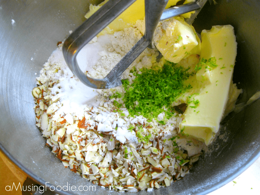 Almond Lime Snowball Cookies Mixing almonds and lime zest with all the other ingredients. Almond lime snowball cookies are the perfect, festive holiday recipe to add to your cookie list!