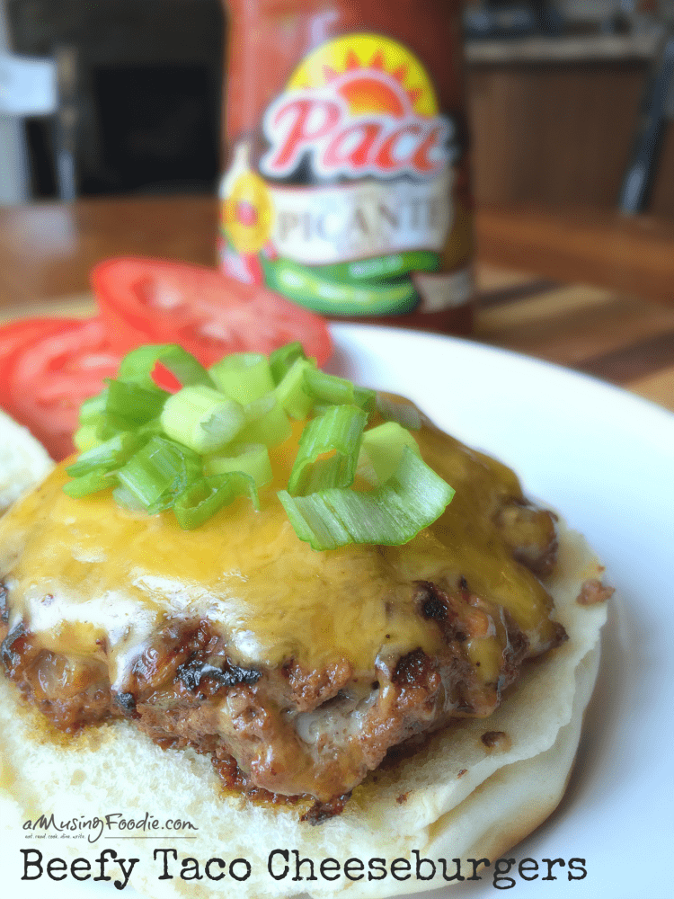 Beef taco cheeseburger on a plate.