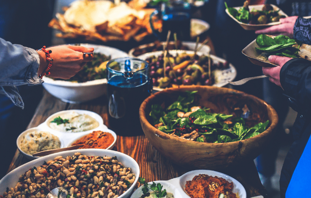 Tablescape with sides and dishes for a large meal.
