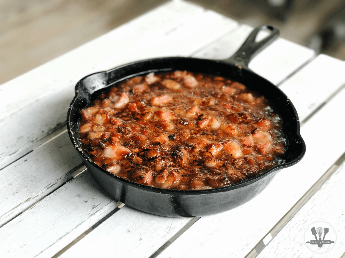 A summer BBQ isn't complete without these easy-to-make sweet and savory baked beans with bacon.