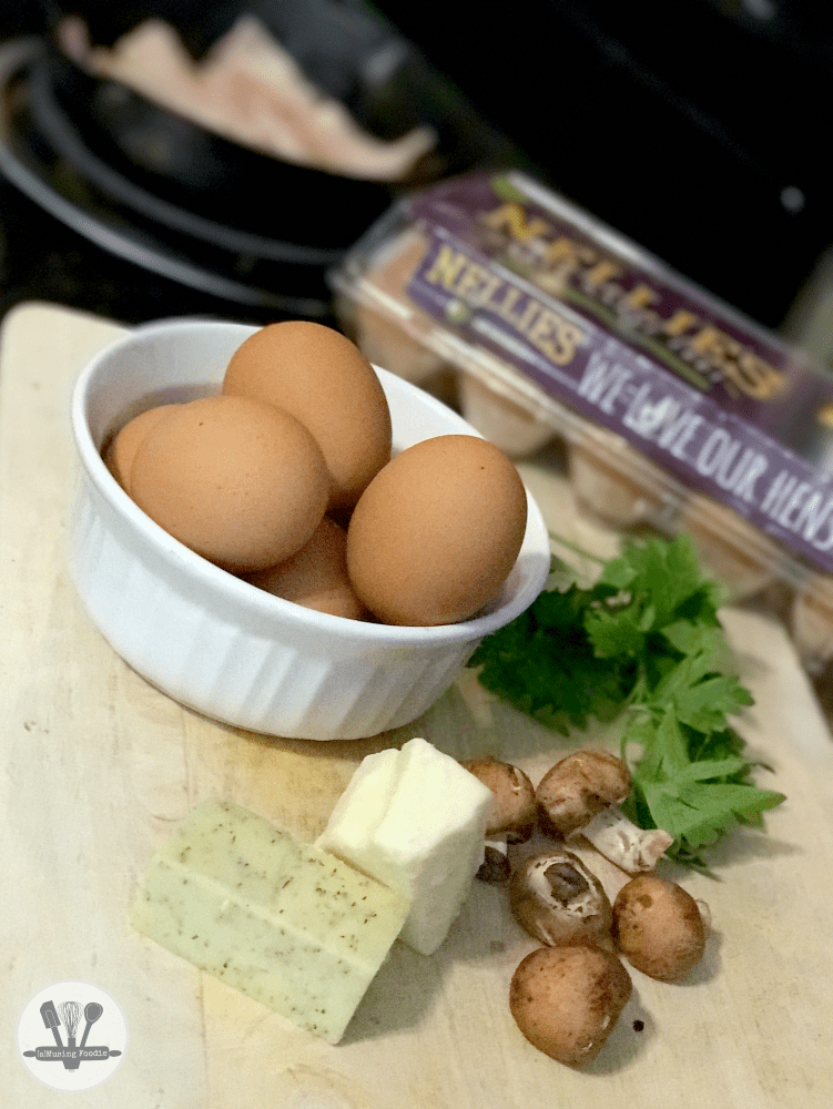 This savory crustless quiche for two is perfect for brunch (or dinner)! It's simply made, with Nellie's® Free Range Eggs, two kinds of cheddar from the Cabot® Creamery co-op of Vermont farm families, bacon, parsley and an assortment of veggies—including organic mushrooms, green onions and ripe heirloom tomatoes from the garden (or from your local farmers' market).