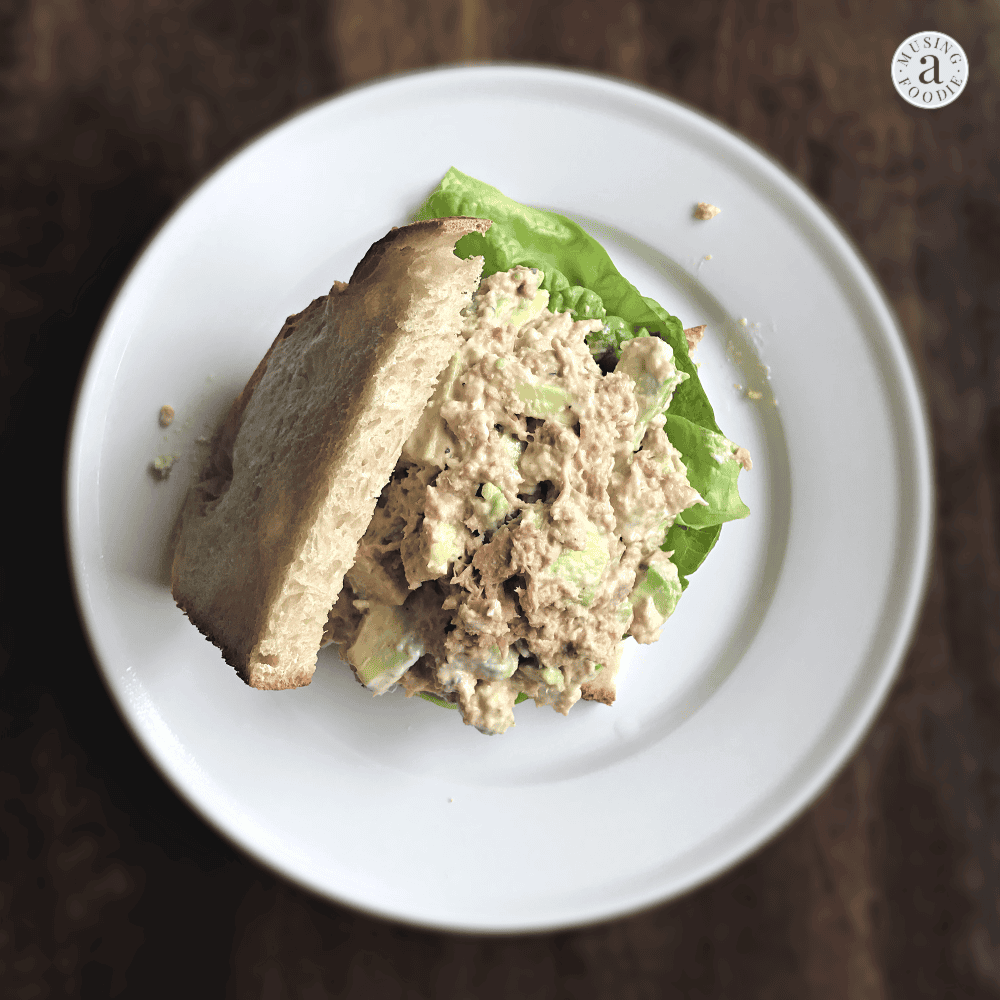 This avocado tuna salad is creamy and delicious, with just the right amount of salt and tang. Perfect eaten on toasted sour dough bread or atop a piece of butter lettuce!