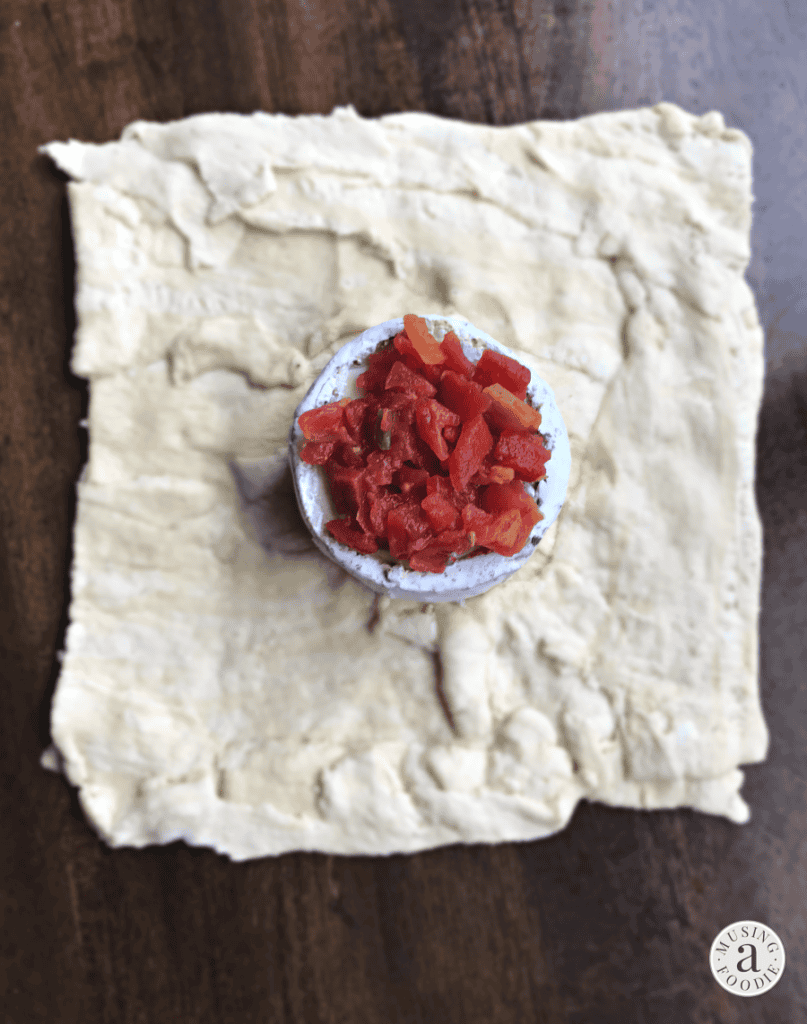 This mouth-watering ooey-gooey baked brie with RO*TEL is a fun and festive appetizer that's perfect for holidays and entertaining!