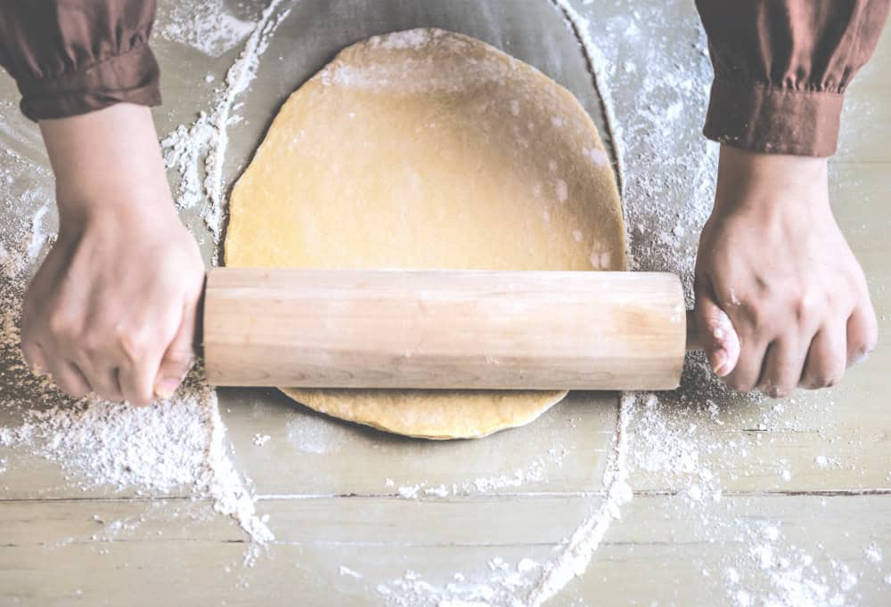 Homemade pizza dough is something you can make with a few simple ingredients and a little time. It's an easy process and the end result yields the best pizza dough and a delicious, chewy hard-to-beat thin, class or thick crust!