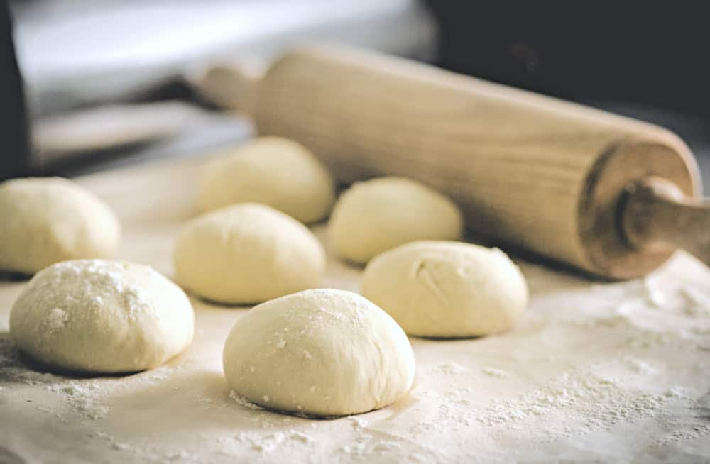 Homemade pizza dough is something you can make with a few simple ingredients and a little time. It's an easy process and the end result yields the best pizza dough and a delicious, chewy hard-to-beat thin, class or thick crust!