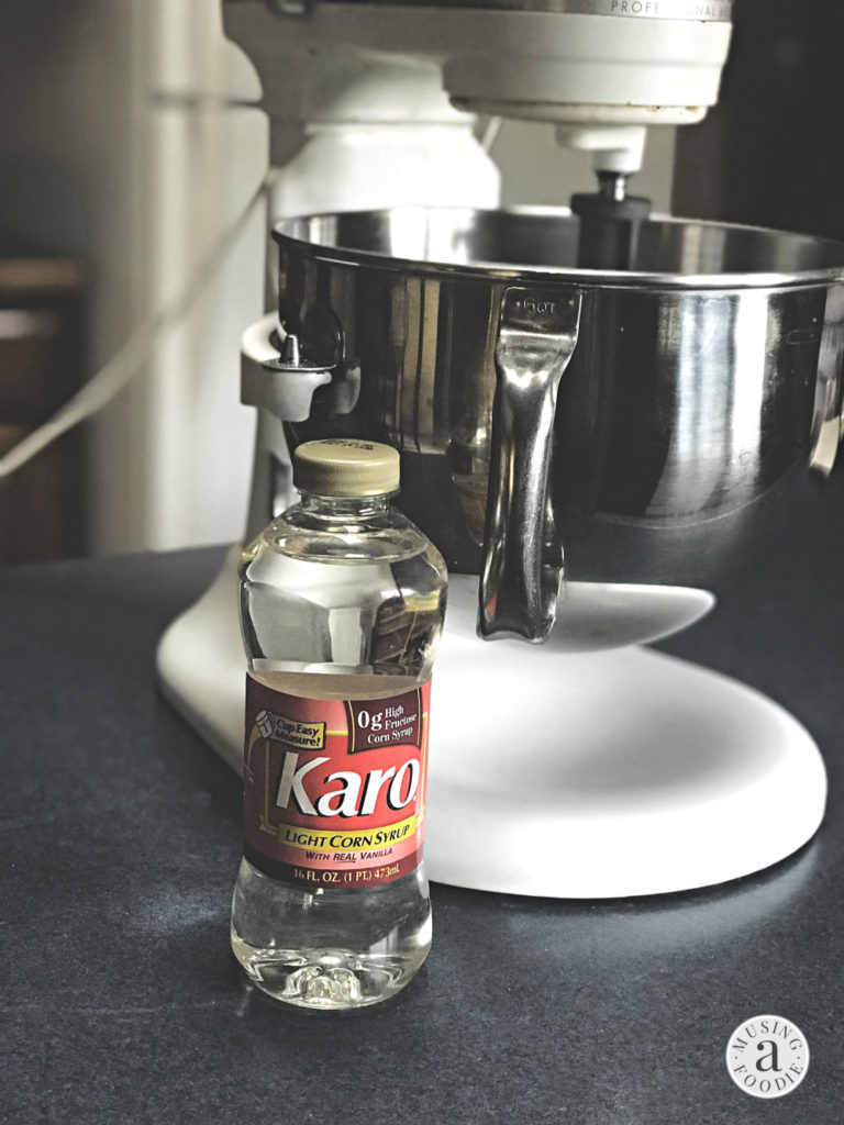 Karo® Corn Syrup next to a stand mixer.