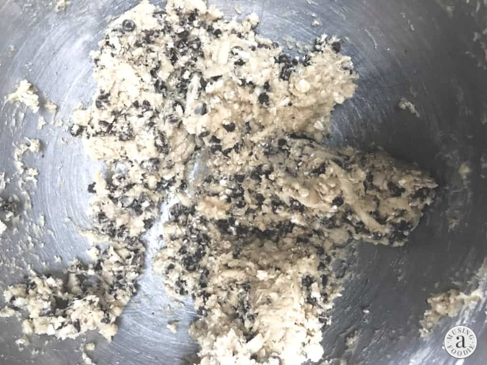 Chewy oatmeal chocolate chip cookie dough with almonds.