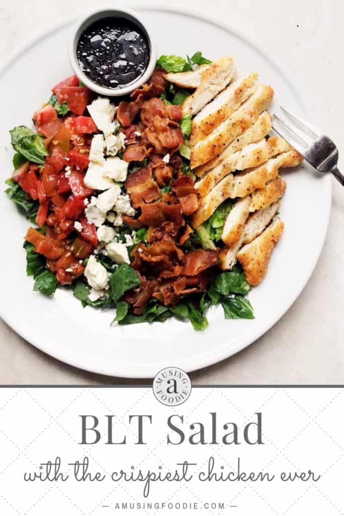 BLT salad with heirloom tomatoes, bleu cheese, bacon, romaine lettuce and crispy chicken and balsamic vinaigrette dressing.