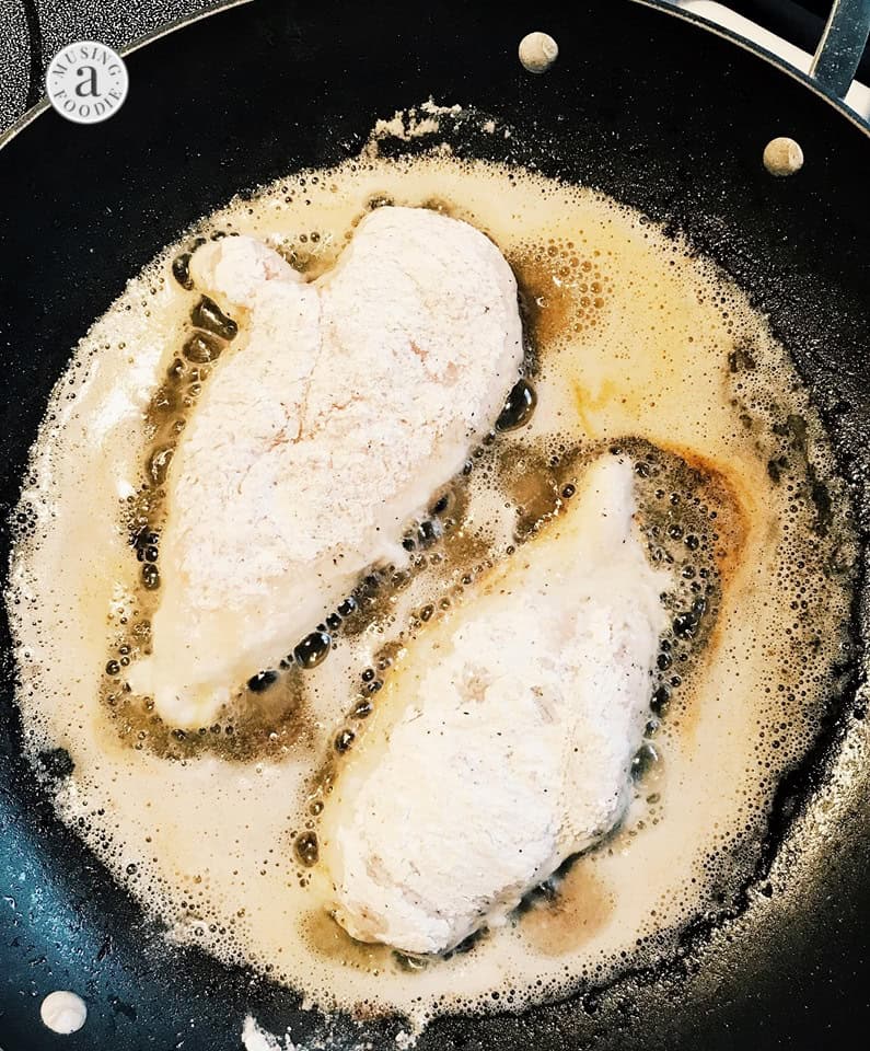 Thinly sliced chicken breasts dredged in a corn starch and flour mix, then seared in bacon grease on the stove.